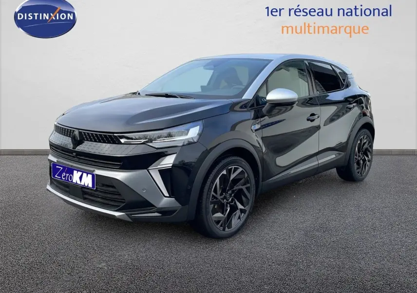 Renault Captur E-Tech hybride noir étoile avec toit gris, vue 3/4 avant droit mettant en valeur ses jantes noires.