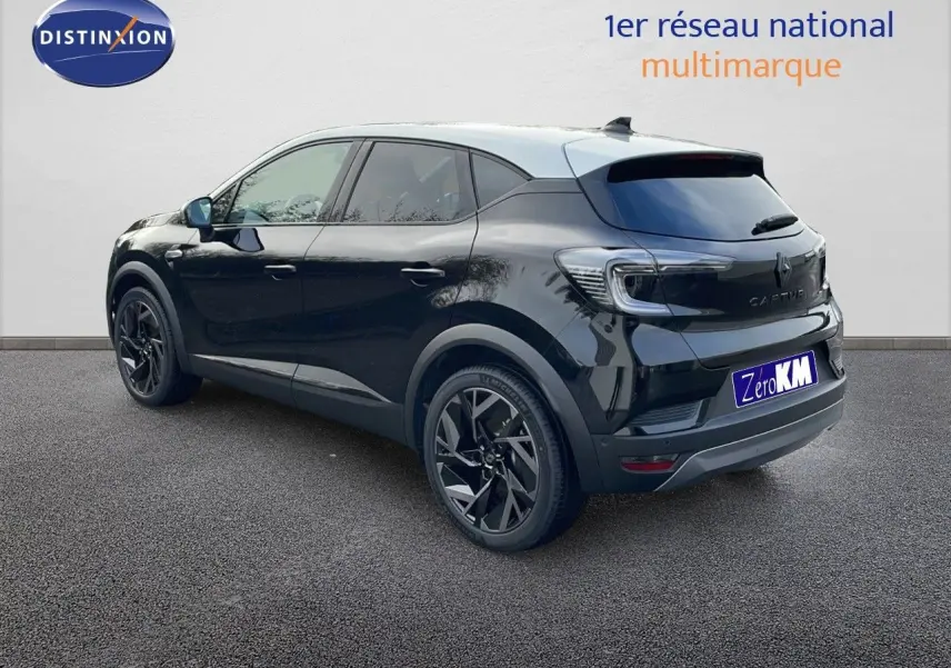 Vue 3/4 arrière droite du Renault Captur noir étoile métal avec toit gris et jantes noires biton.