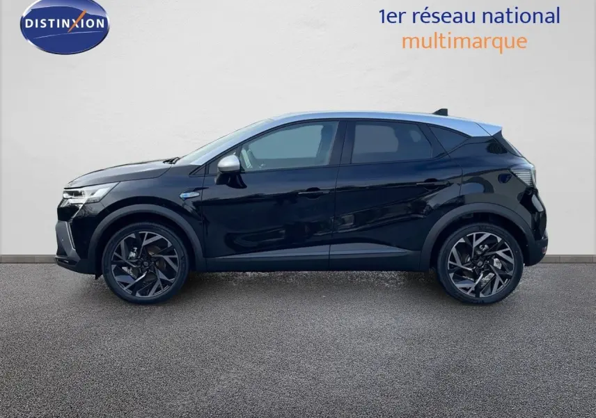 Profil côté gauche du Renault Captur E-Tech hybride 2025 noir étoile avec toit gris et jantes noires distinctives.