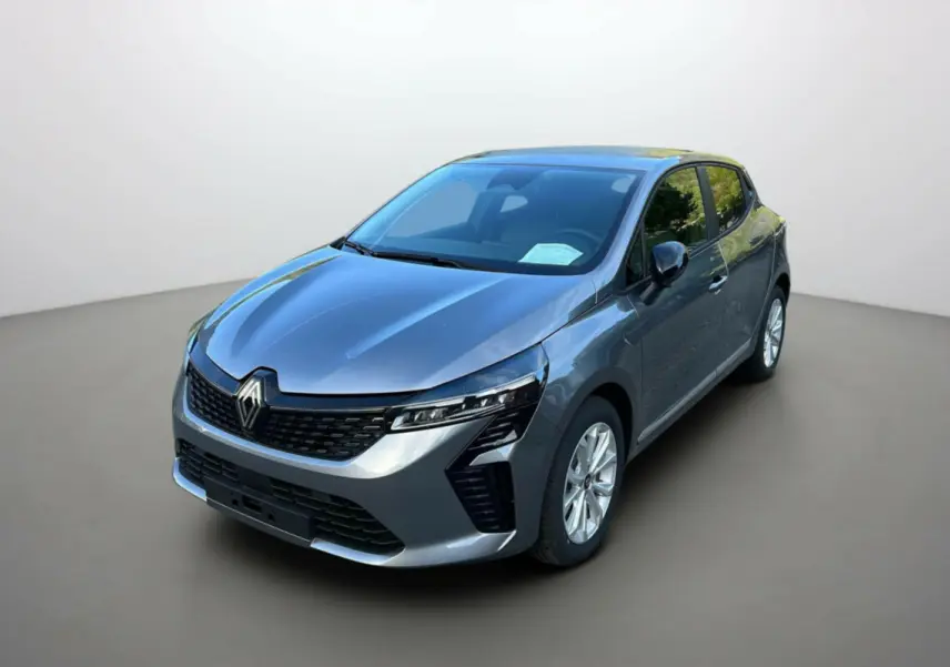 Renault Clio 2025 gris schiste vue 3/4 avant droit, calandre noire et phares LED distinctifs, finition Evolution PK Look.