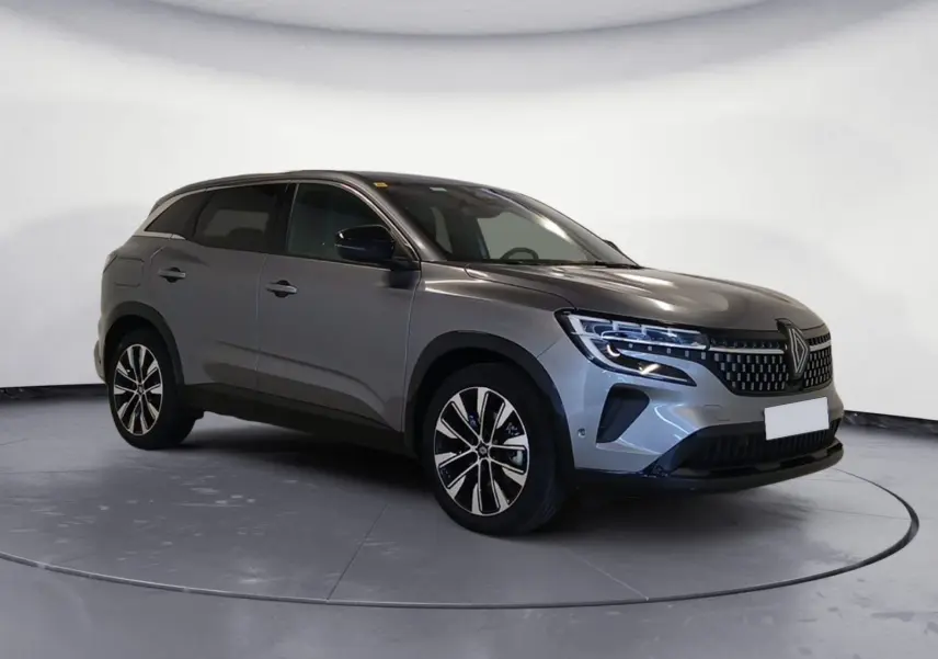 Renault Austral E-Tech hybride gris, vue 3/4 avant droit, avec jantes alliage 19'' Komah diamantées noir.