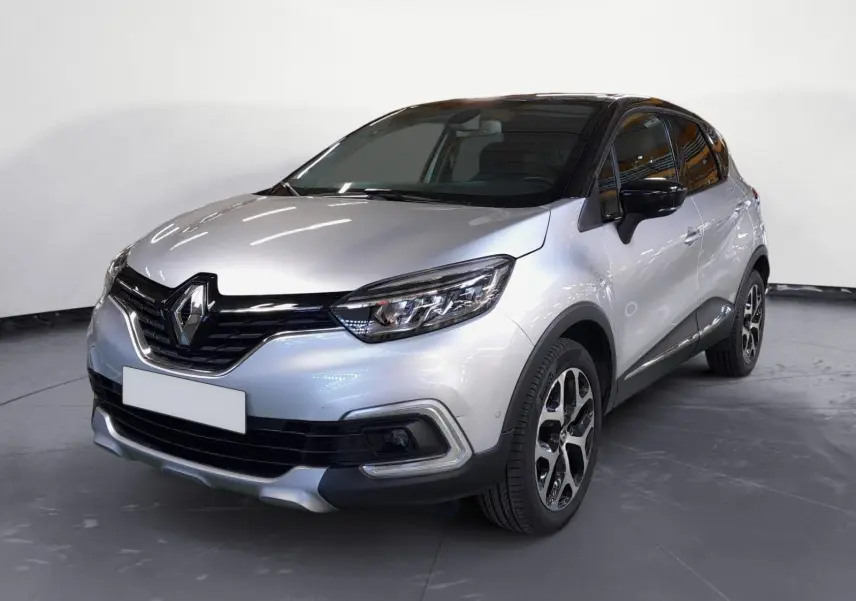 Renault Captur TCe 120 Energy Iridium 2017 gris clair métal avec toit noir, vue 3/4 avant droit, jantes alliage distinctives.