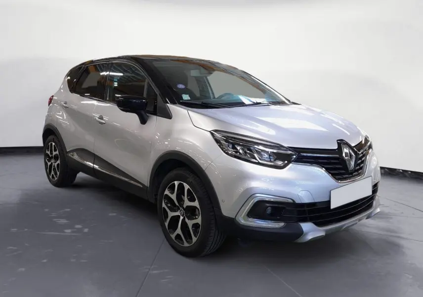 Renault Captur TCE 120 Energy Iridium gris clair métal avec toit noir, vue 3/4 avant droit, jantes alliage 17 pouces.