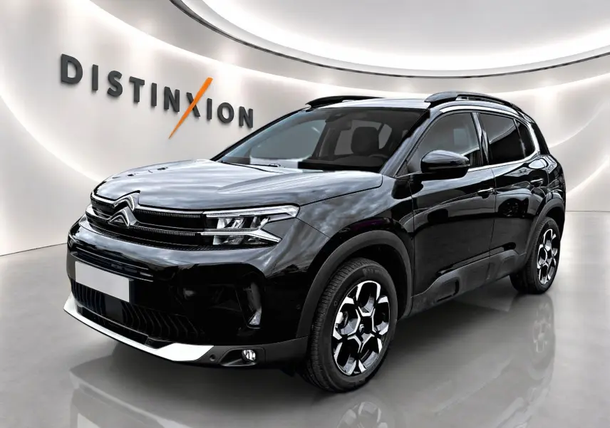 Citroën C5 Aircross noir vue 3/4 avant droit, avec jantes alu et signature lumineuse LED distinctive.
