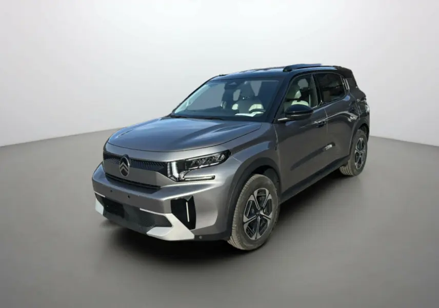 Citroën C3 Aircross hybride gris mercury avec toit noir, vue 3/4 avant droit sur fond neutre.