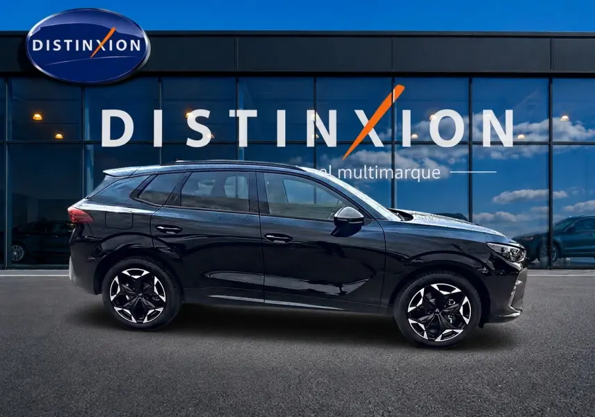 Vue latérale droite d'un SUV CUPRA TERRAMAR noir 2026 avec jantes alu noires et toit noir brillant.