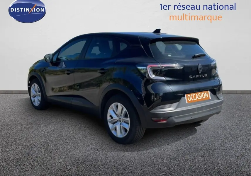 Renault Captur E-Tech hybride noir étoile métal, vue 3/4 arrière côté gauche avec feux arrière LED visibles.