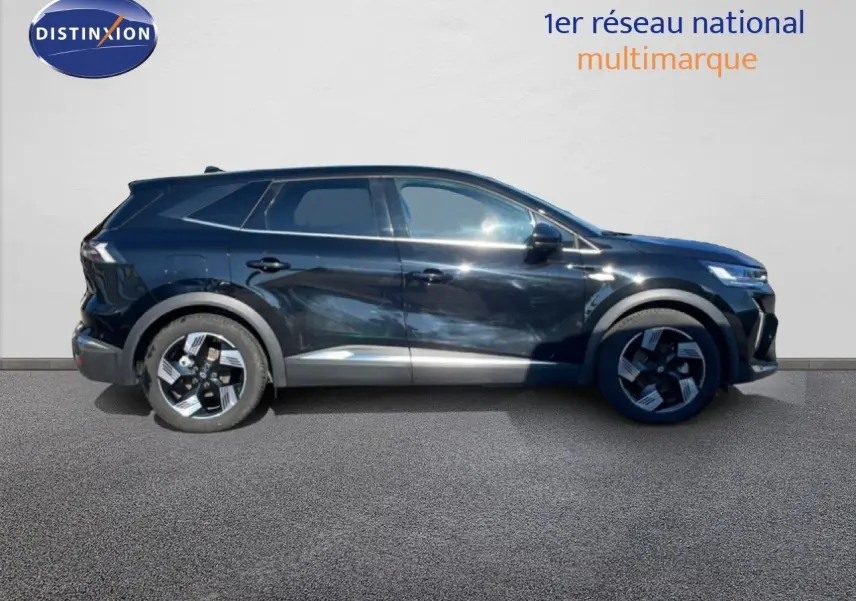 Vue de profil droit du Renault Symbioz 2025 noir étoile métal avec jantes distinctives et lignes modernes.