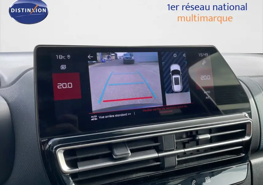 Écran tactile intérieur du Citroën C5 Aircross 2024 montrant la caméra de recul et l'affichage de la climatisation.