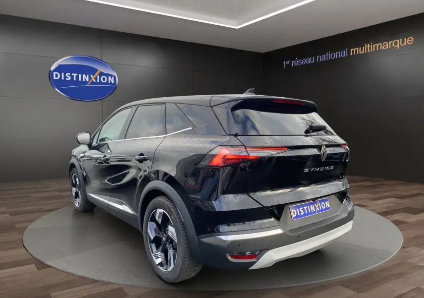 Vue 3/4 arrière droite du Renault Symbioz noir étoile 2025 avec feux LED et jantes alliage distinctives.