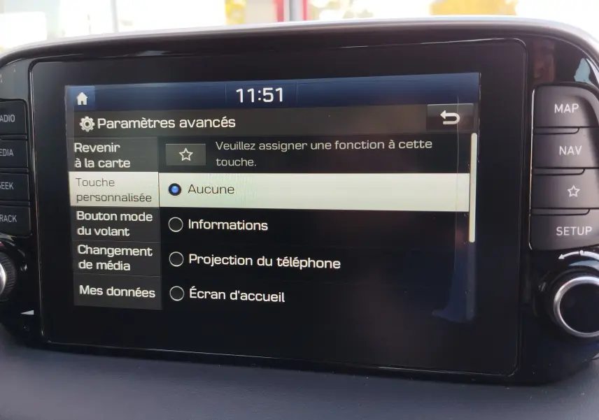 Écran tactile central du Hyundai Tucson 2019 affichant les paramètres avancés de personnalisation des fonctions.