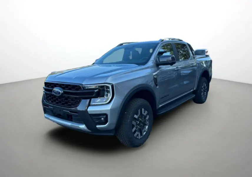 Ford Ranger 2.3 PHEV gris iconic vu en 3/4 avant droit, avec calandre noire et jantes alu foncées.
