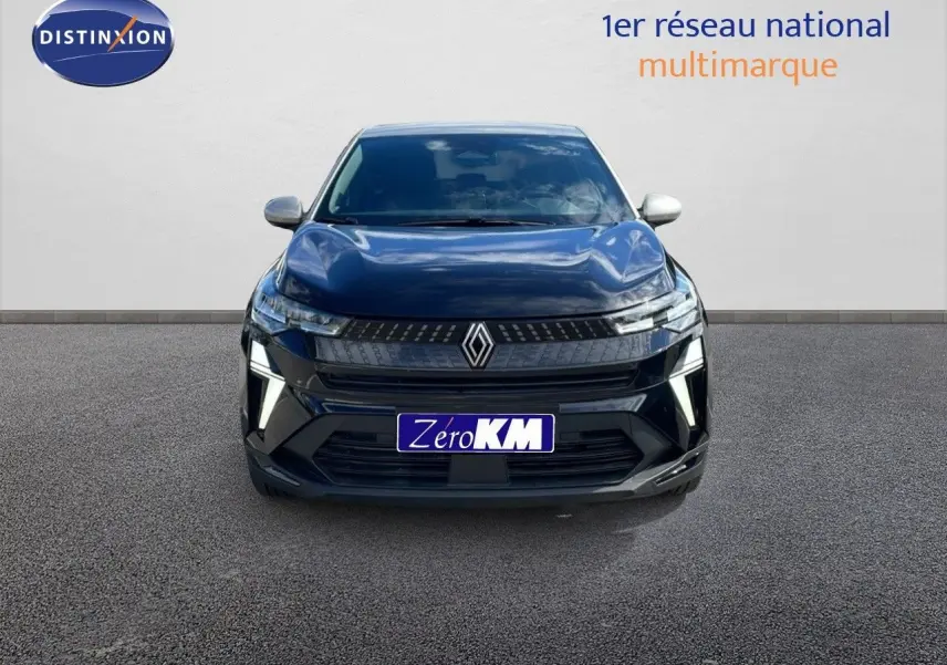 Vue avant d’un Renault Captur 2025 noir étoile métal avec toit gris, mettant en valeur sa calandre et ses feux LED distinctifs.