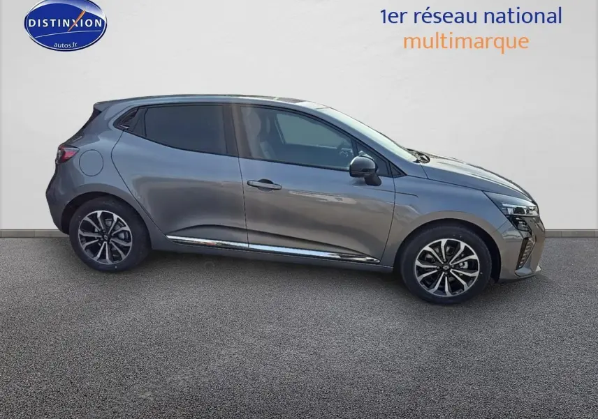 Profil côté gauche d'une Renault Clio V gris schiste 2025 avec jantes alu et poignées ton carrosserie