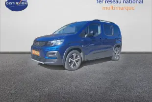 Peugeot Rifter 2023 KIAMA BLUE METAL en 3/4 avant droit, véhicule utilitaire compact avec jantes bi-ton et toit surélevé.