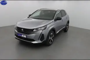 Peugeot 3008 gris Artense vue 3/4 avant droit, avec calandre noire et jantes alliage bicolores.