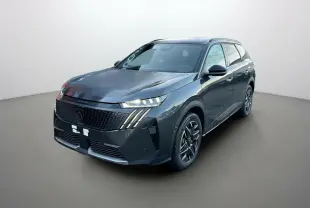 Peugeot 5008 Hybrid gris titane avec toit noir, vue 3/4 avant mettant en valeur ses phares LED et jantes alu.