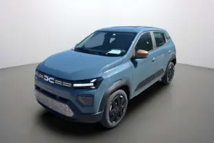 Dacia Spring électrique 65 Extrême bleu ardoise en 3/4 avant droit avec rétroviseurs cuivrés et jantes noires.