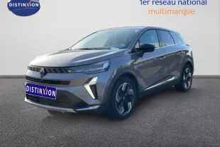 Renault Symbioz gris cassiopée métal en 3/4 avant droit, avec calandre moderne et jantes bi-ton distinctives.