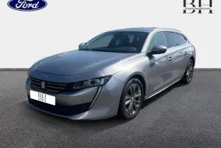 Peugeot 508 SW gris Artense vue 3/4 avant droit avec calandre chromée et jantes alu.