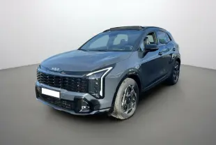 KIA SPORTAGE 2026 gris eclipse avec toit noir, vue 3/4 avant mettant en valeur ses phares Matrix LED et jantes alu.