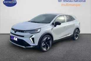 Renault Symbioz blanc nacré métal en 3/4 avant droit, avec jantes noires et détails modernes sur carrosserie.
