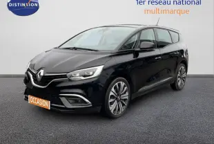 Renault Grand Scénic noir étoile métal en 3/4 avant droit, avec jantes alliage et calandre chromée visible.