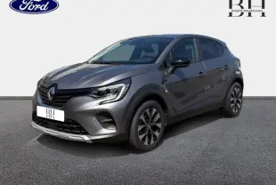 Renault Captur 1.6 E-Tech hybride gris Cassiopée métallisé en 3/4 avant droit avec jantes alliage et feux LED.