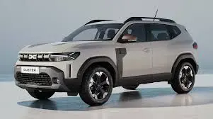 Vue 3/4 avant d'un Dacia Duster Hybrid 140ch Journey 2025 couleur Sandstone avec jantes biton et toit noir.