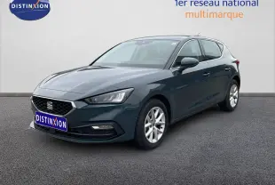 SEAT LEON 2.0 TDI gris magnétique, vue 3/4 avant droit, avec jantes alliage et calandre noire.