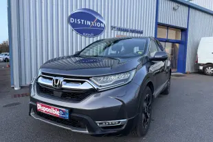 Vue 3/4 avant droite d'un Honda CR-V Hybrid 184 Elegance gris métallisé avec calandre chromée et feux LED.
