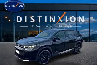 SUV Citroën C5 Aircross noir vue 3/4 avant droit, jantes alliage noires et phares LED visibles devant showroom Distinxion.