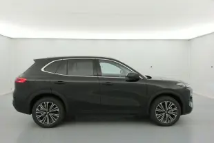Vue de profil côté gauche du SUV Geely STARRAY polar black, soulignant ses jantes alliage et lignes épurées.