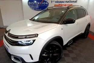 Citroën C5 Aircross Hybrid blanc vue 3/4 avant droit avec jantes noires et toit noir contrasté.