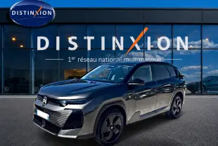 Citroën C5 Aircross hybride gris platinium 3/4 avant droit avec toit noir devant showroom Distinxion.