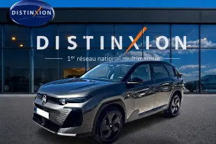 Citroën C5 Aircross gris platinium 3/4 avant droit, toit noir bi-ton, jantes alliage 19 pouces, devant showroom Distinxion.