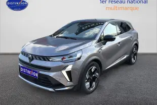 Renault Symbioz gris métallisé en 3/4 avant droit, avec jantes noires et phares LED distinctifs.