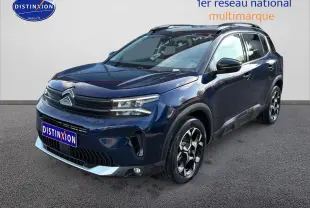 Citroën C5 Aircross bleu eclipse en 3/4 avant droit avec jantes alu et toit noir brillant.