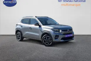 Citroën C3 1.2 Turbo 100ch MAX gris Mercury vue 3/4 avant droit avec jantes au design hexagonal.