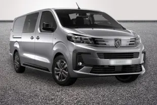 Peugeot Expert Fourgon gris clair vu en 3/4 avant droit avec calandre distinctive et feux modernes.
