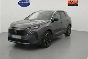 Peugeot 5008 Hybrid gris en 3/4 avant droit, avec jantes alliage 19 pouces et calandre distinctive noire.