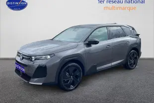 Vue 3/4 avant droite d’un Citroën C5 Aircross gris platinium avec jantes alliage noires et toit noir.