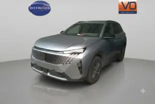 Peugeot 5008 gris en 3/4 avant droit, avec calandre distinctive et jantes alliage 18 pouces visibles.