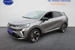 Renault Symbioz gris schiste en 3/4 avant droit, avec jantes alliage et feux LED distinctifs.