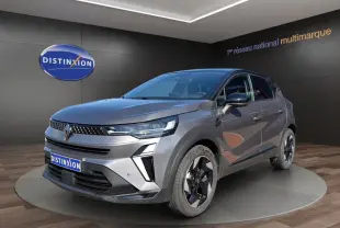 Renault Captur Techno TCe 90 gris foncé en 3/4 avant droit, avec phares LED et jantes noires distinctives.