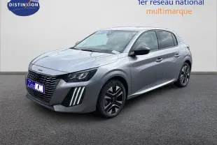 Peugeot 208 électrique gris Artense métal vue 3/4 avant droit, avec feux LED verticaux distinctifs et jantes stylisées.