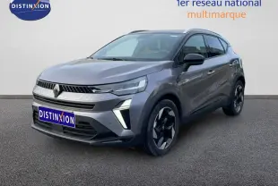 Renault Captur 2025 gris cassiopée métal avec toit noir, vue 3/4 avant mettant en valeur ses optiques LED distinctives.
