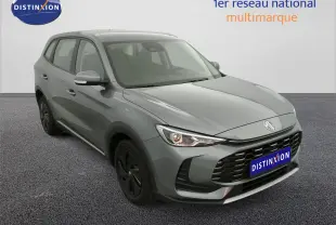 MG ZS 2026 gris Hampstead, vue 3/4 avant droit, avec jantes acier noires et calandre imposante.