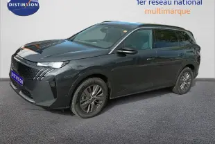 Peugeot 5008 gris titane métal en vue 3/4 avant droit, avec jantes alliage et calandre distinctive.