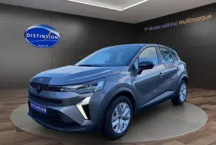 Renault Captur 2024 gris Cassiopée avec toit noir en 3/4 avant droit, feux LED et jantes 17 pouces visibles